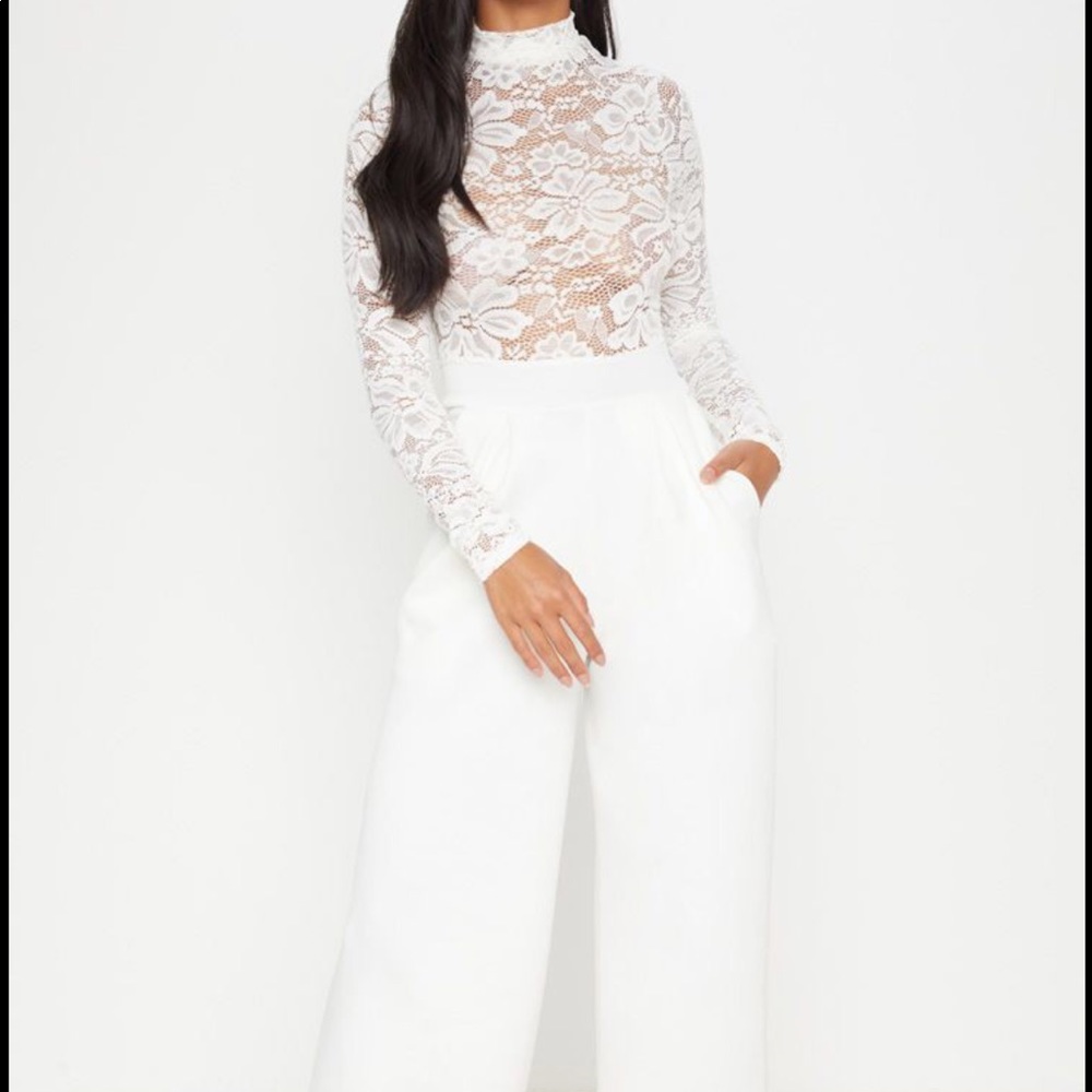 New with tags.Petite White Lace Jumpsuit.UK6 (US2)